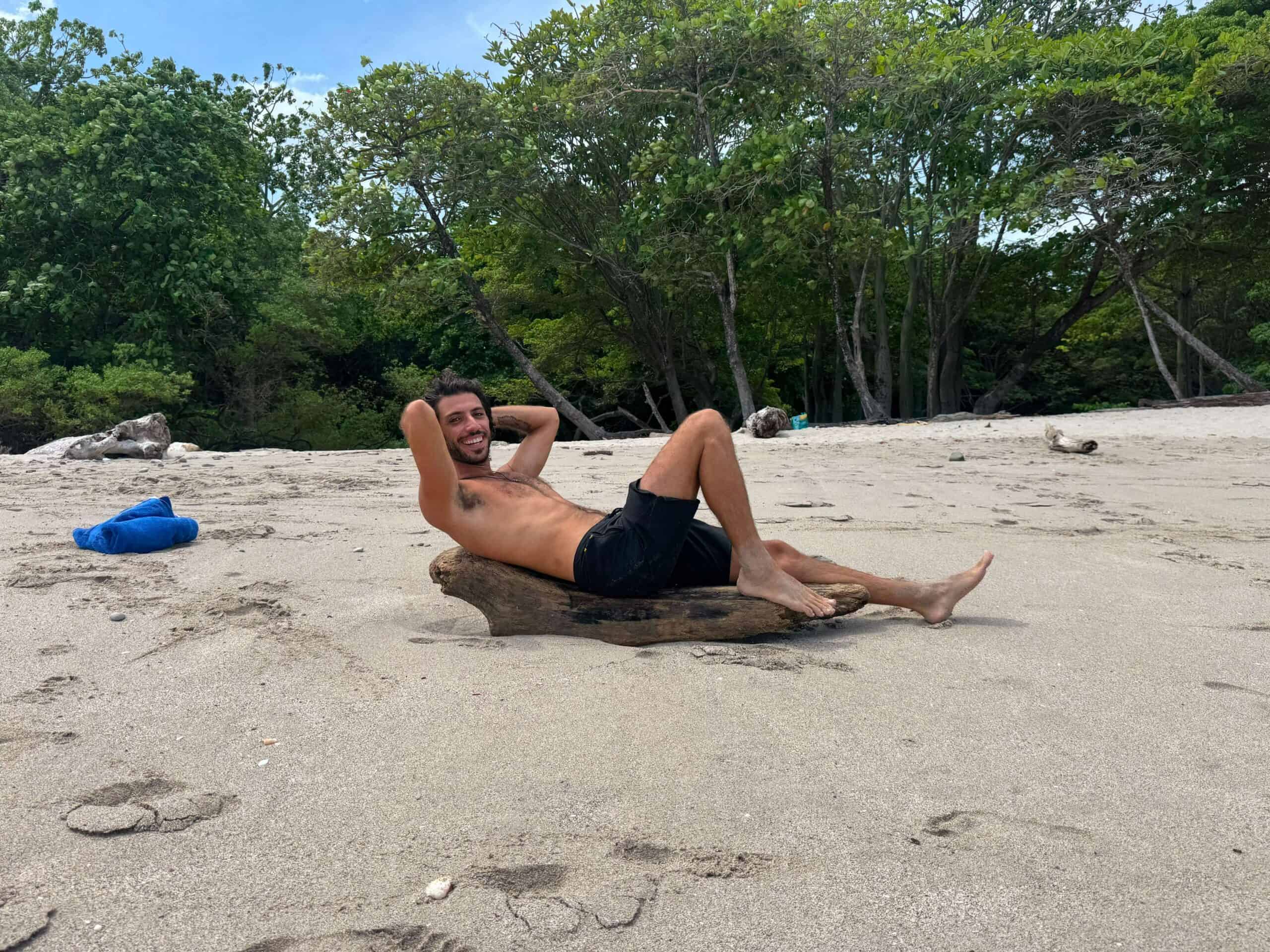 Adrian relaxing on the beach in Santa Teresa