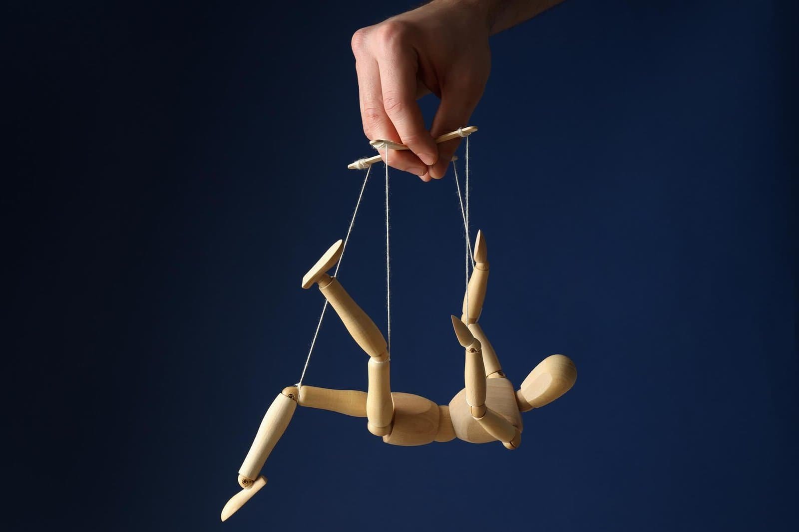 Master pulling puppet strings