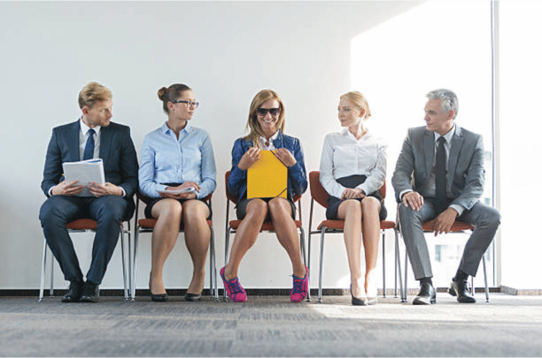 Professional business meeting with diverse team of executives in modern office setting.
