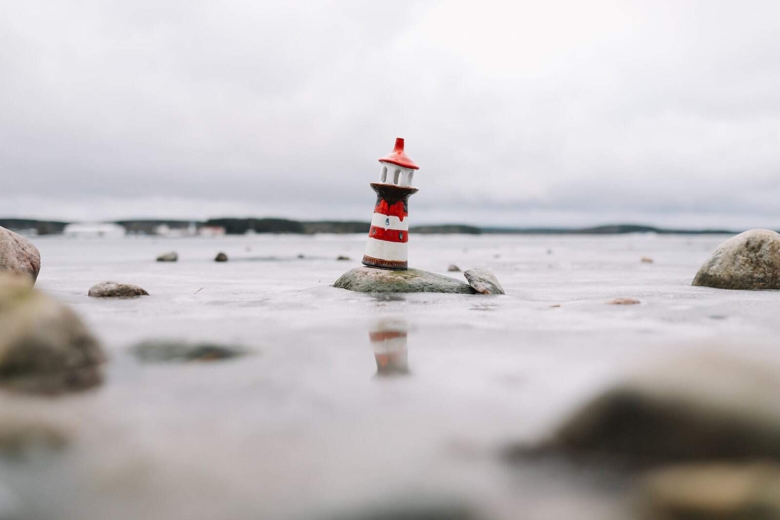 small lighthouse in the sand