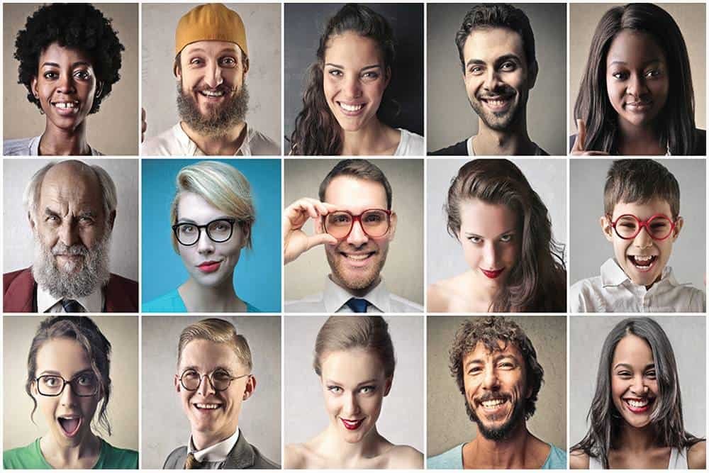 Smiling diverse group of people showcasing joy and confidence in a professional headshot collection.