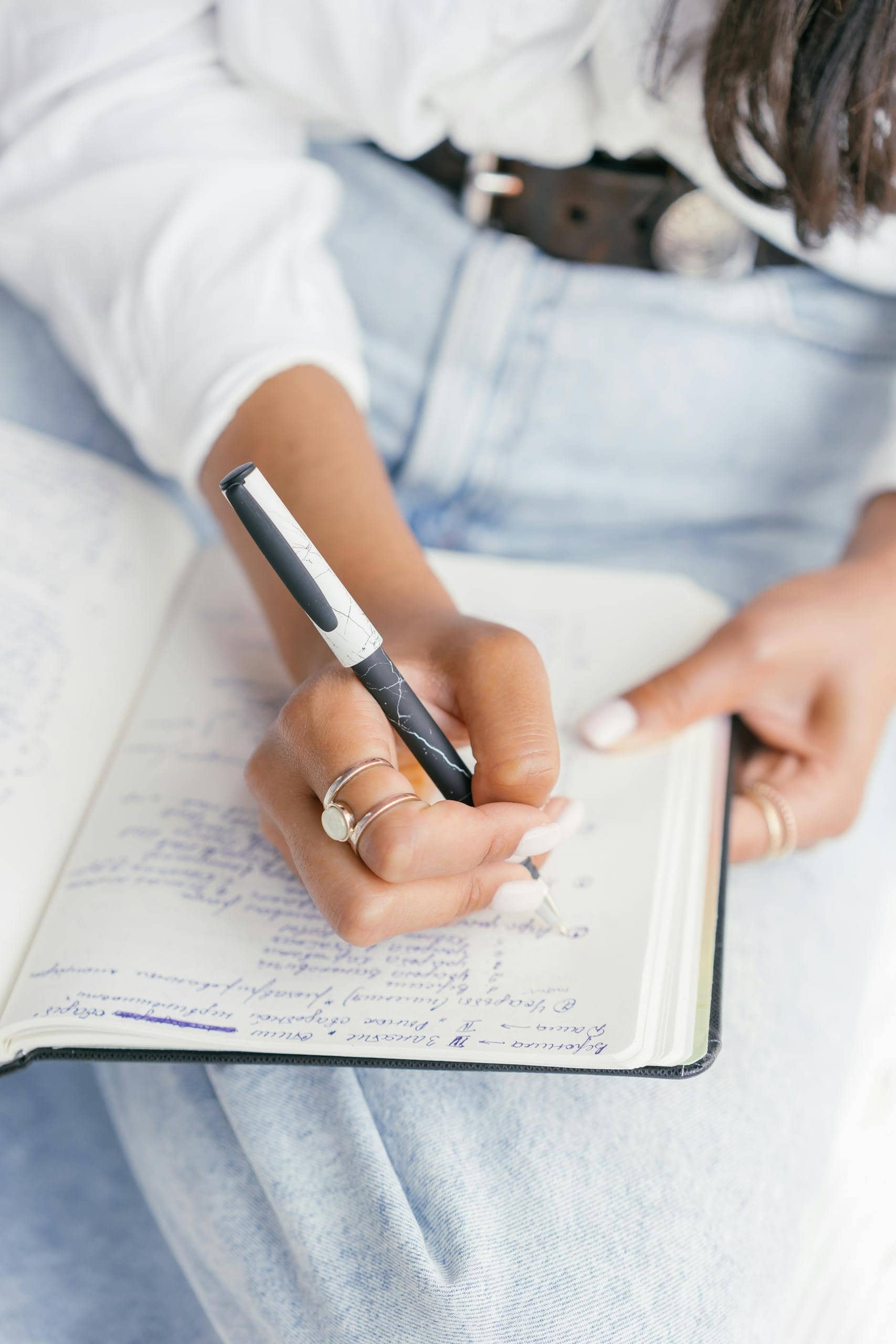 Bright morning light and journal symbolizing rebuilding a daily routine during trauma recovery.