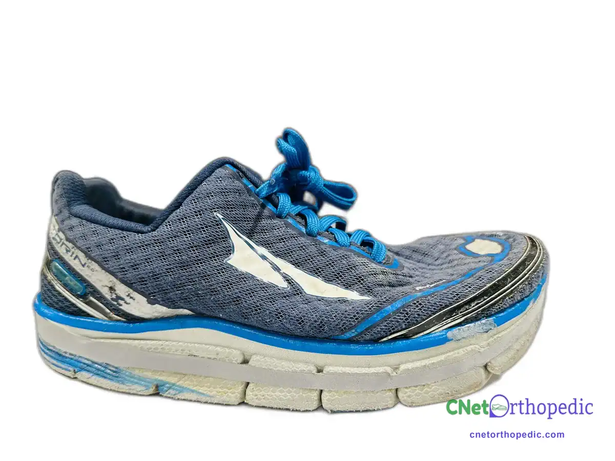Blue Altra running shoe with a small sole lift