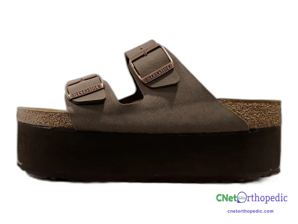 Brown Birkenstock sandal with a 1.5 inch cork-coloured sole lift