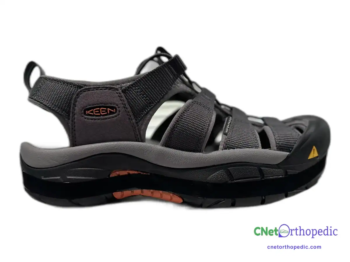 Grey Keen sandal with a 1/2 inch shoe lift in the sole