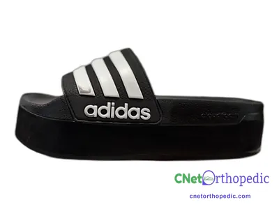 Shoe lift added to a men's black Adidas sandal