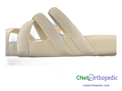 Shoe lift added to a women's beige sandal