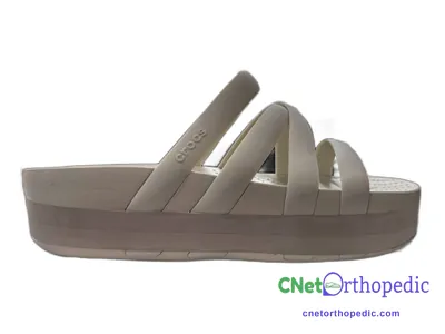 Shoe lift added to a women's grey sandal