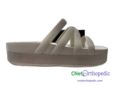 Shoe lift added to a women's grey sandal