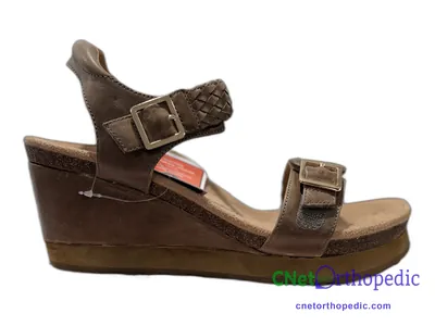 Shoe lift added to a women's sandal
