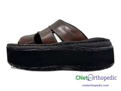 Shoe lift added to a men's sandal
