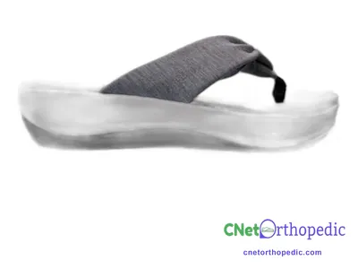 Shoe lift added to a women's grey sandal