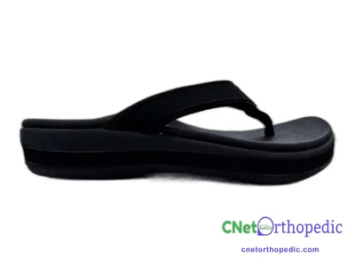 Shoe lift added to a women's black sandal