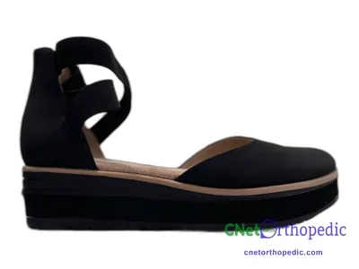 Shoe lift added to a women's black sandal