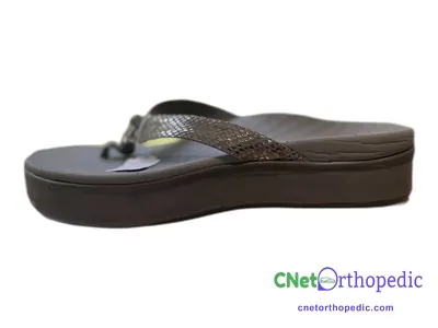 Shoe lift added to a women's grey sandal