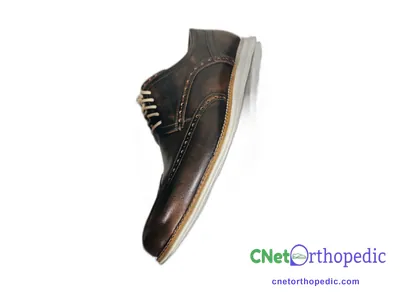 Shoe lift added to a men's dress