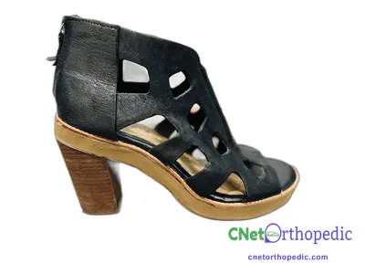 Shoe lift added to a women's black dress