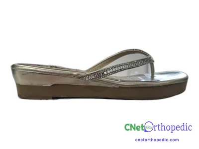 Shoe lift added to a women's grey sandal