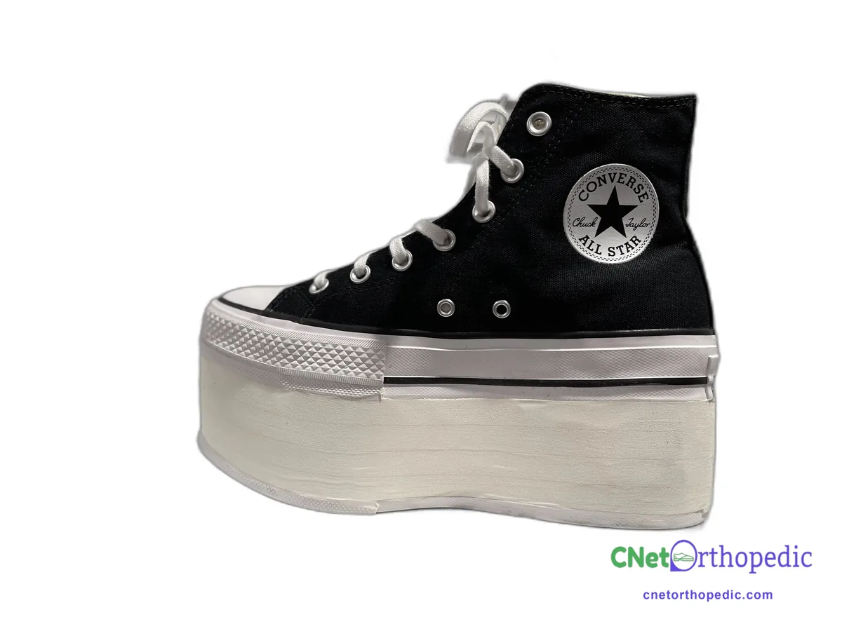 Black Converse high-top with a 2.5 inch white sole lift