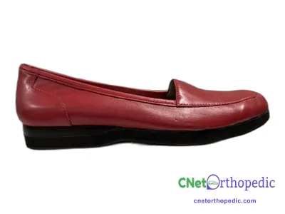 Shoe lift added to a women's brown dress