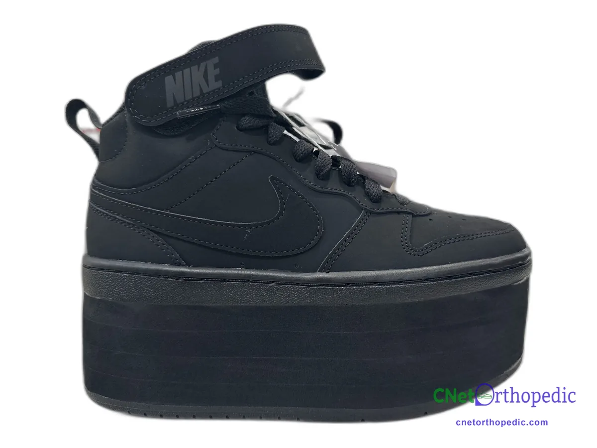Black Nike high-top sneaker with a 3 inch black shoe lift