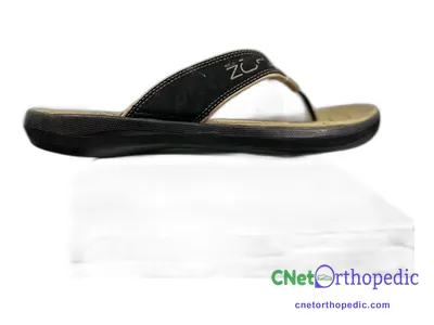 Shoe lift added to a black sandal