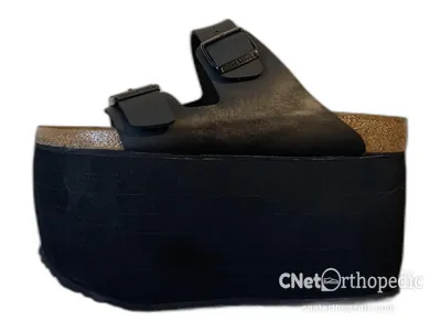 Shoe lift added to a women's black Birkenstock sandal