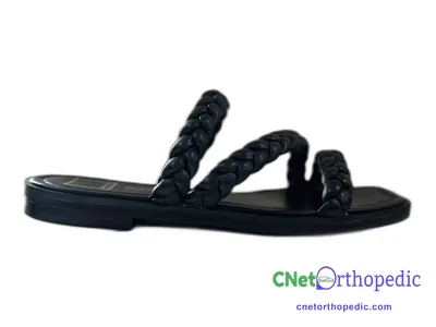Shoe lift added to a black sandal