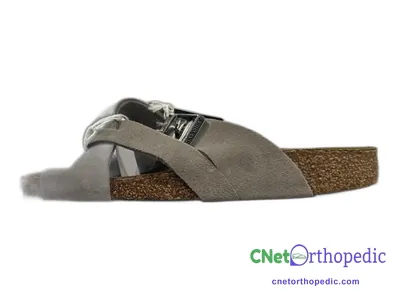 Shoe lift added to a women's grey sandal