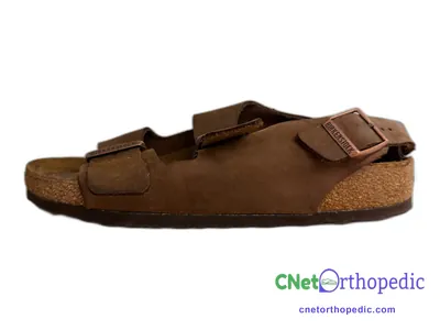 Shoe lift added to a men's brown Birkenstock sandal