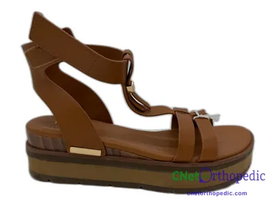 Shoe lift added to a women's brown sandal