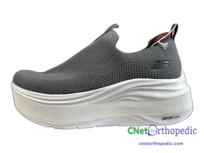 Shoe lift added to a grey sandal