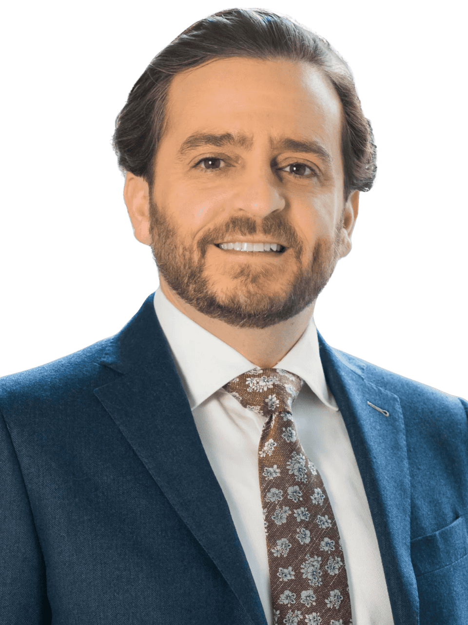 Professional man in a blue suit smiling for a business portrait.