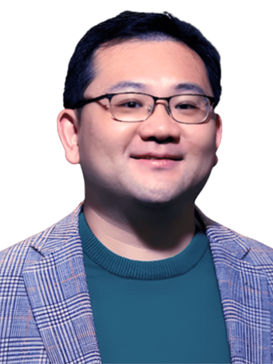 Professional man smiling, wearing glasses and a plaid blazer, portrait shot.