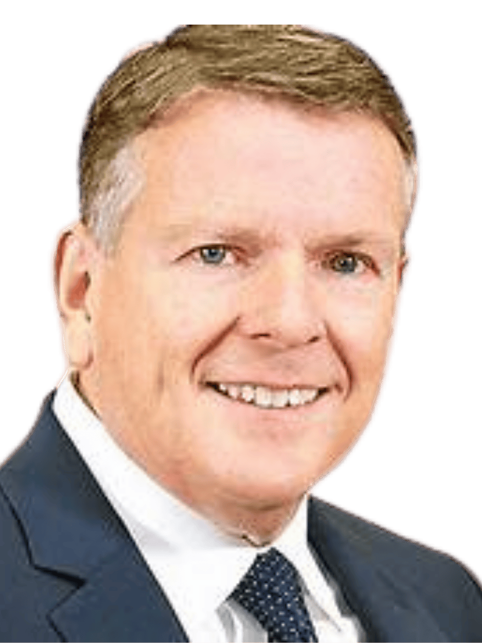 Professional man in suit smiling, representing connection and networking skills.