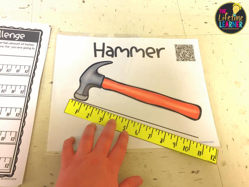 construction classroom transformation showing measuring a line on a poster