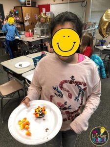 student holding turkey oreo