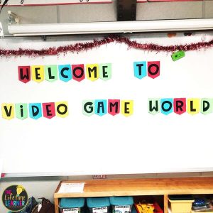 classroom with a "welcome to video game world" sign on the board