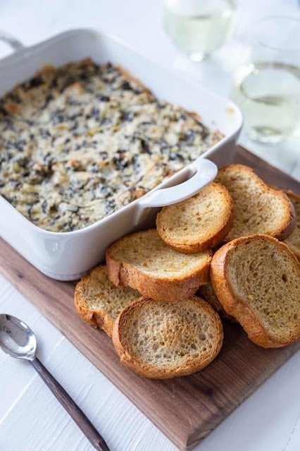 Vegan spinach artichoke dip baked until golden