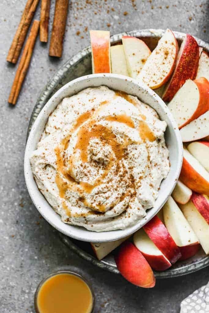 Whipped caramel apple dip served with sliced apples.