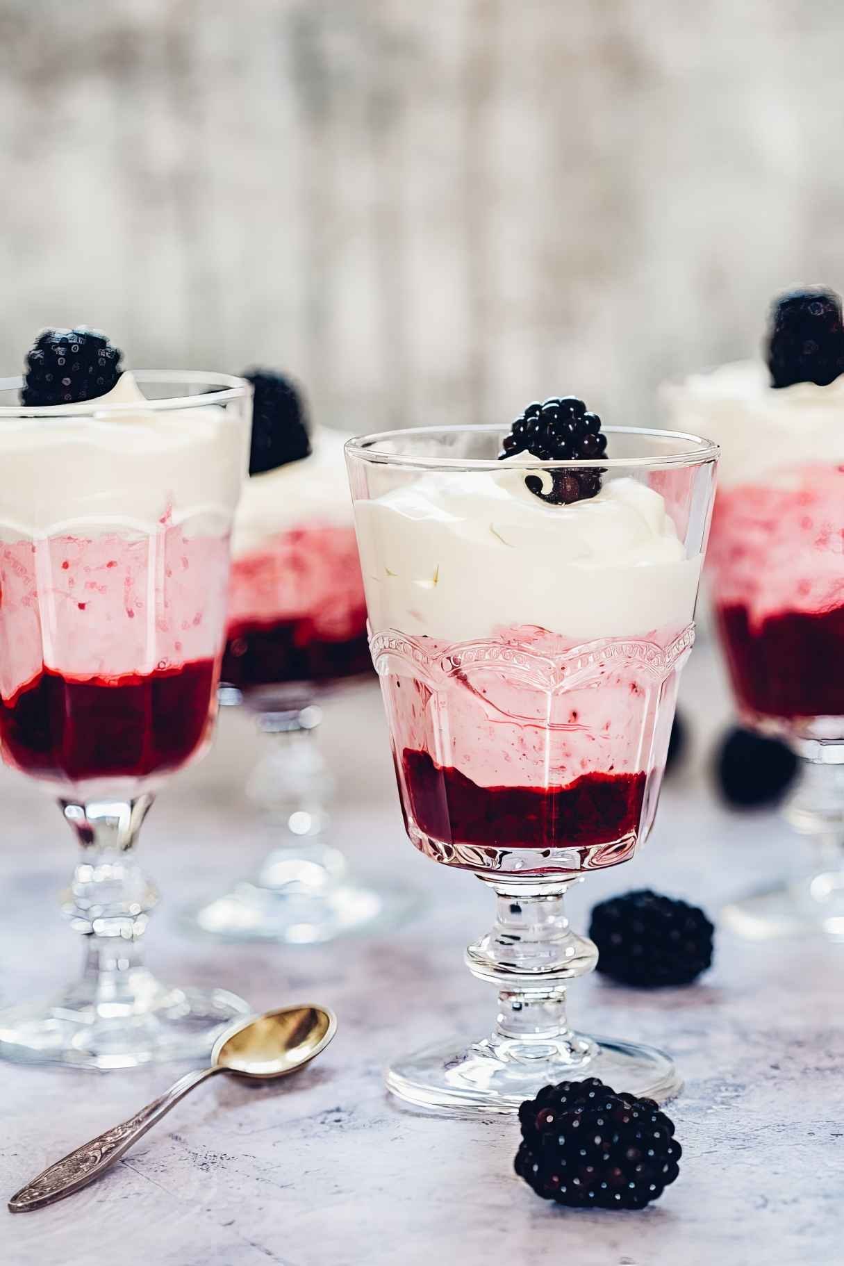 Layered Blackberry Fool dessert in glasses