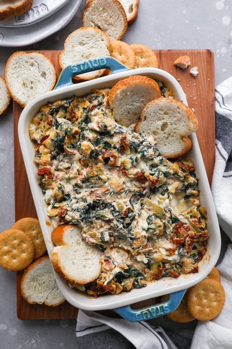 Spinach artichoke dip with sun-dried tomatoes.