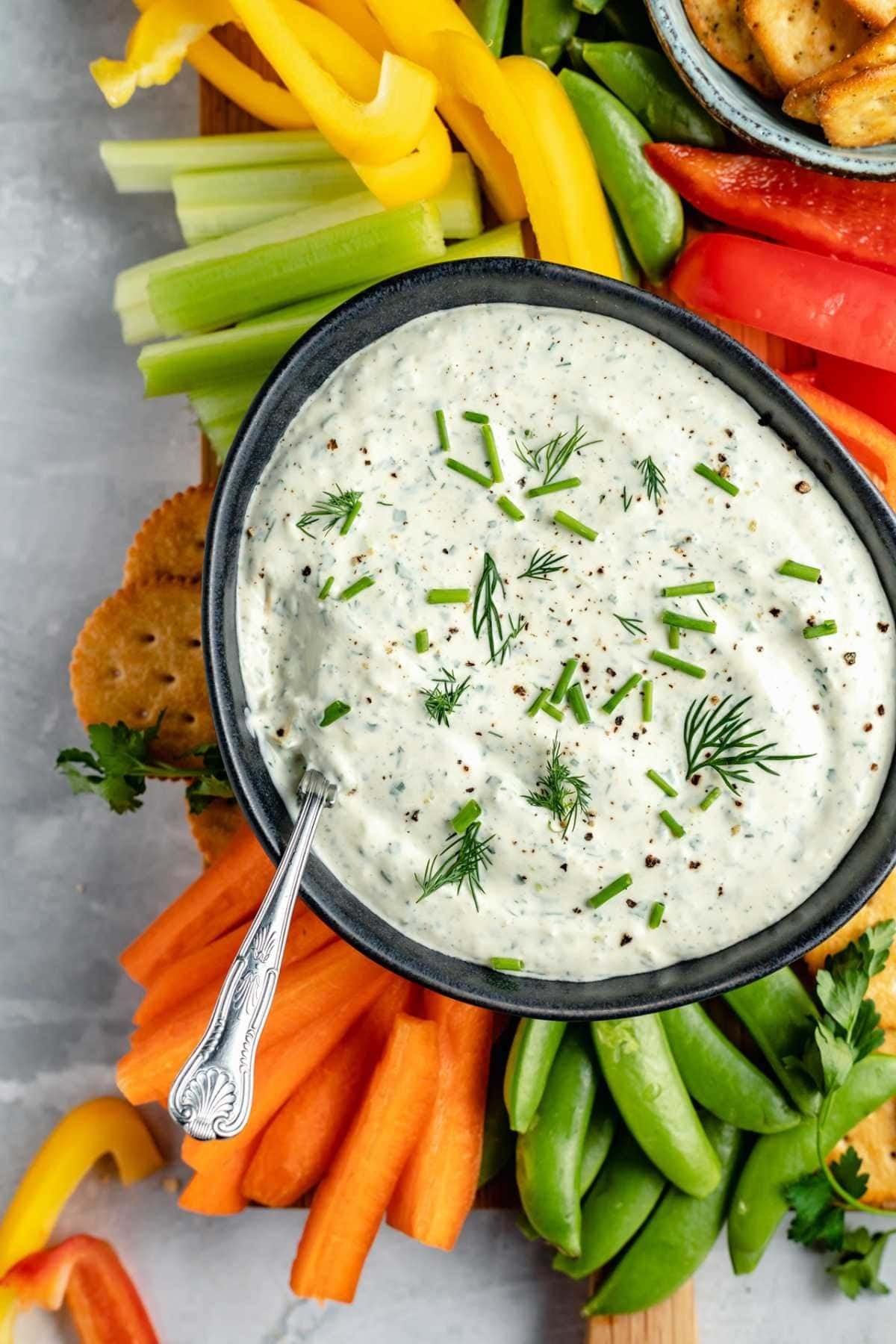 Herb cream cheese dip with dill and green onion.