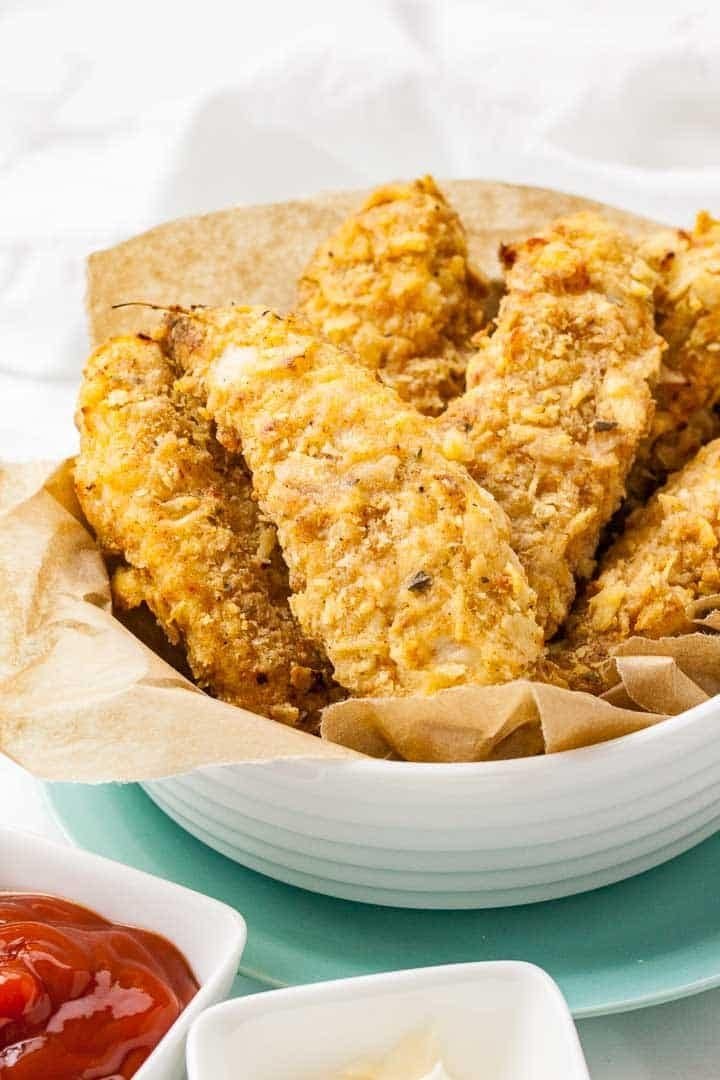 Golden air fryer chicken tenders with dipping sauce