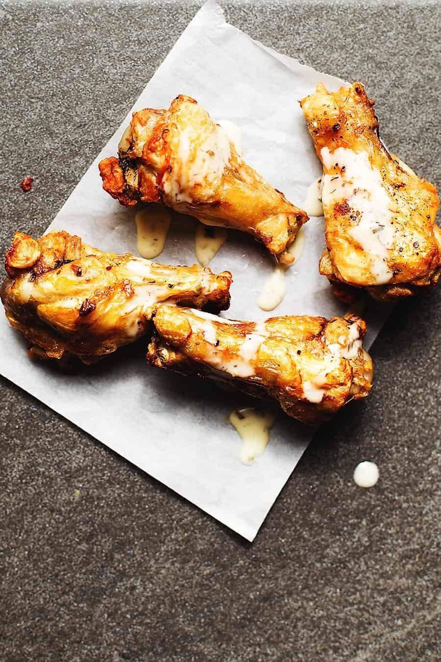 Crispy air fryer chicken wings tossed in sauce