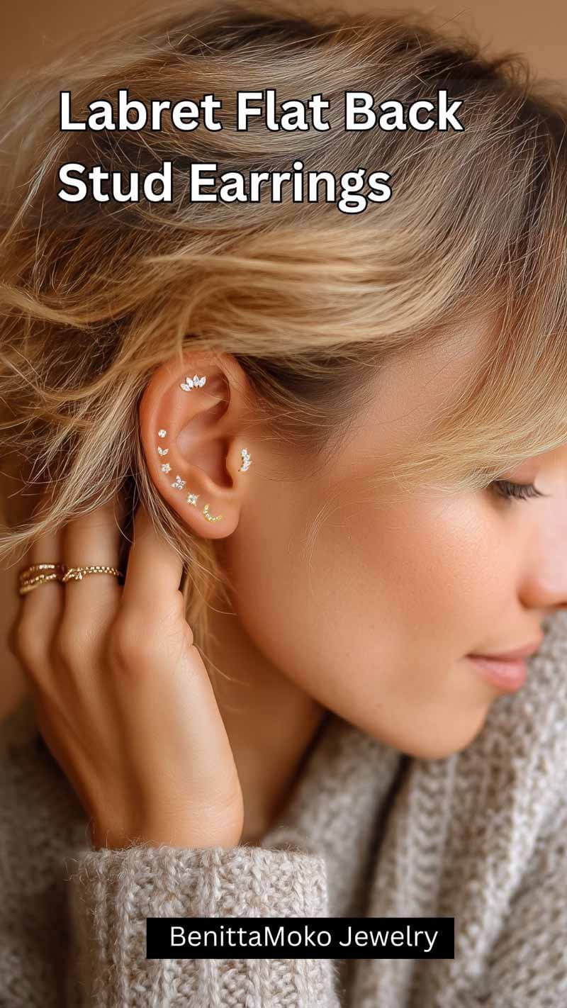 Model wearing gold labret flat back studs in lobe and cartilage piercings