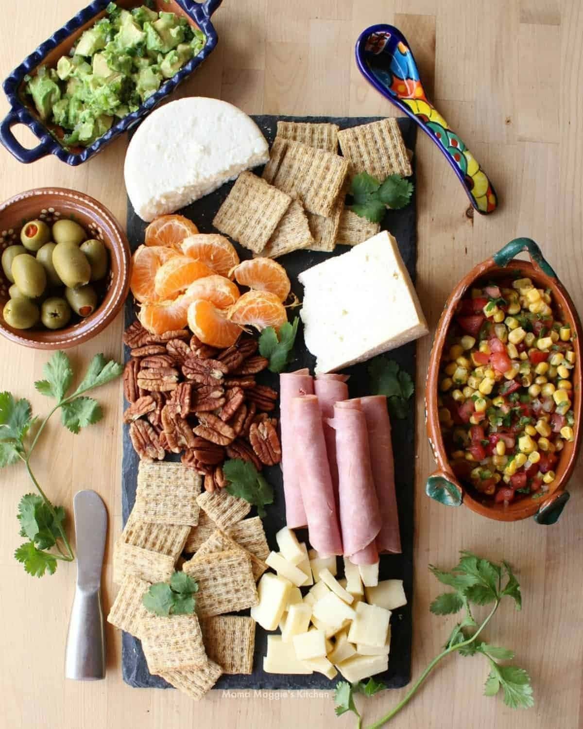 Fiesta charcuterie with Mexican cheeses and snacks