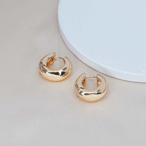 Chunky Gold Hoops — classic thick hoop earrings in warm gold tone