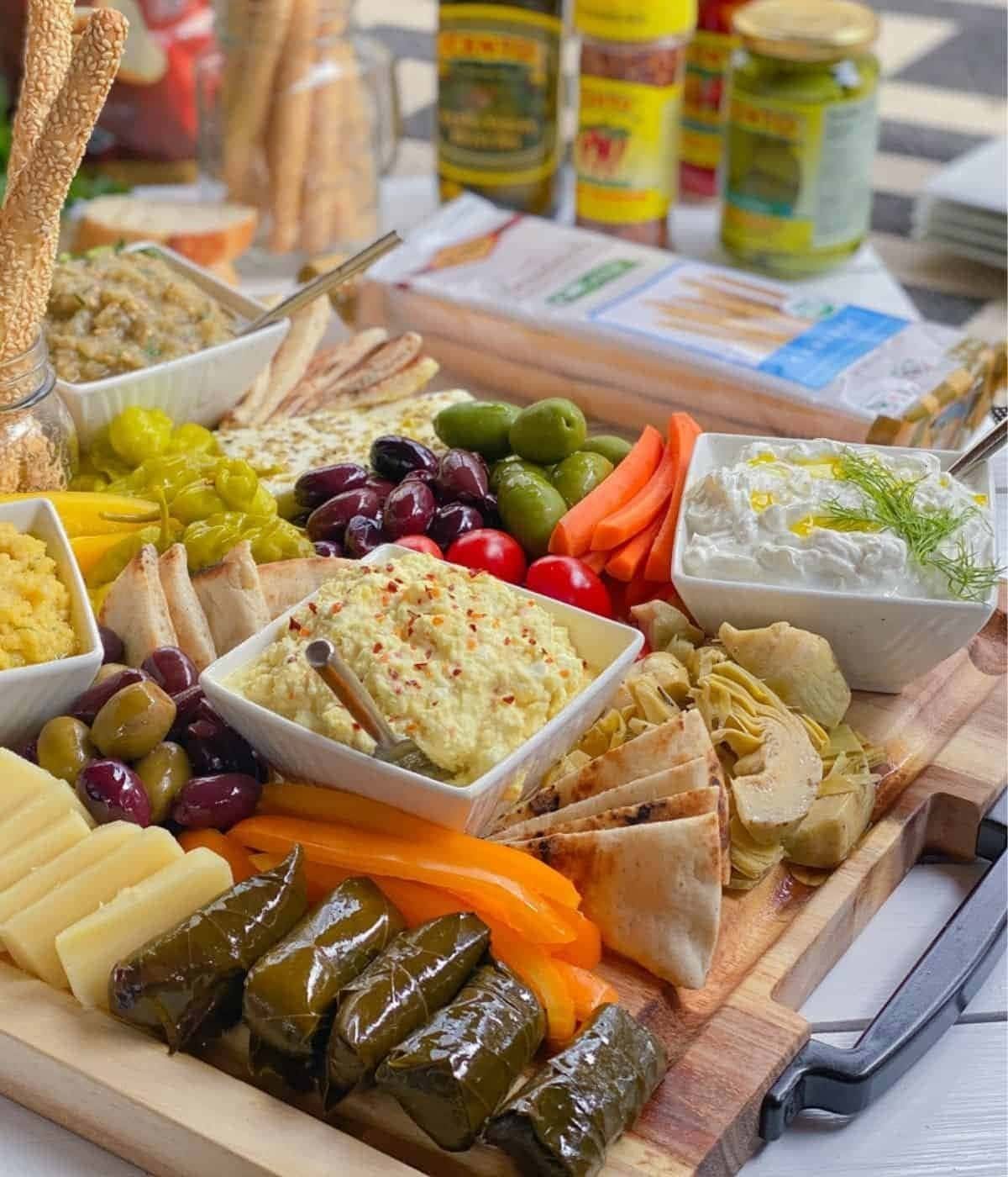 Greek meze platter with feta, olives and dips