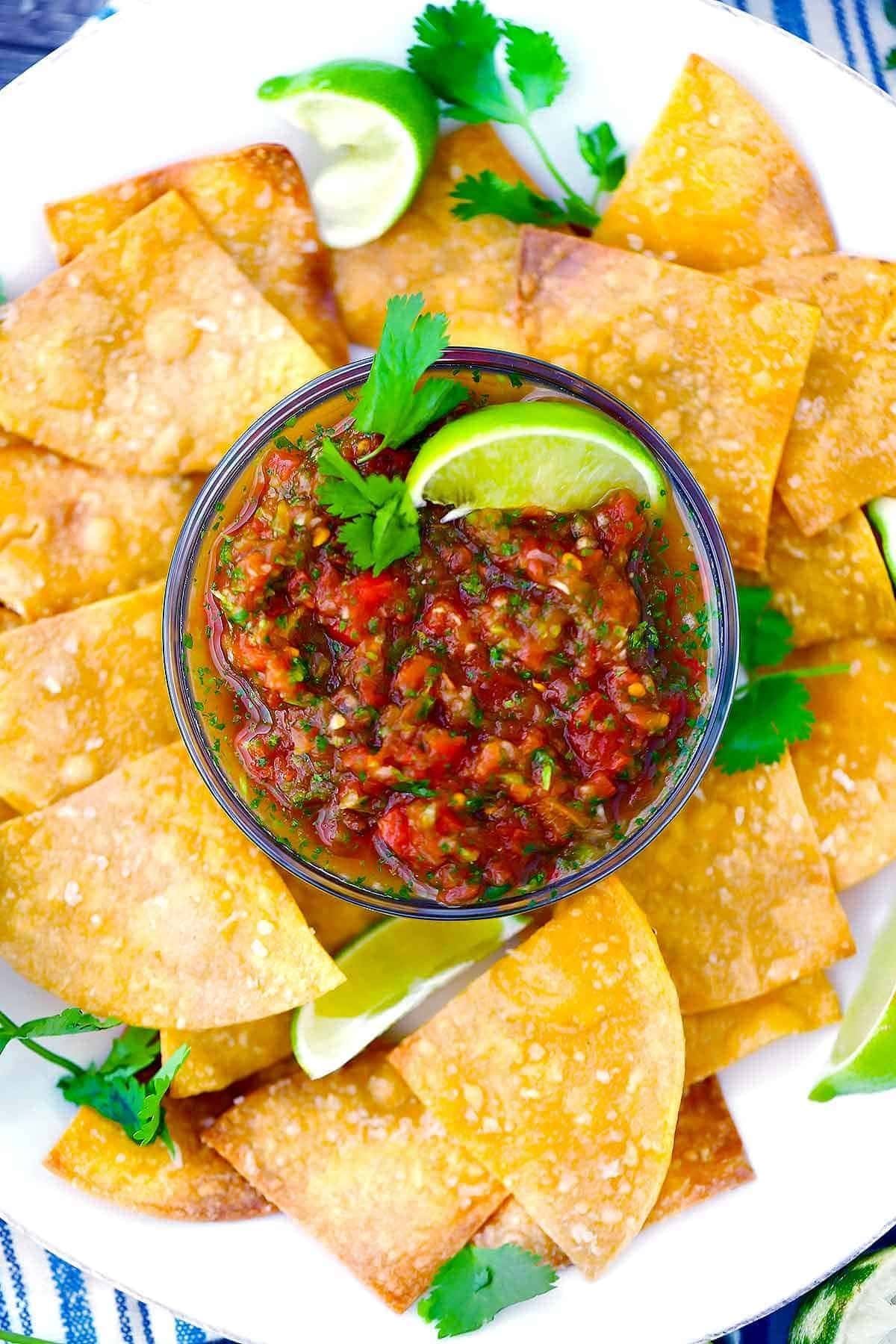 Homemade salsa in a bowl with chips